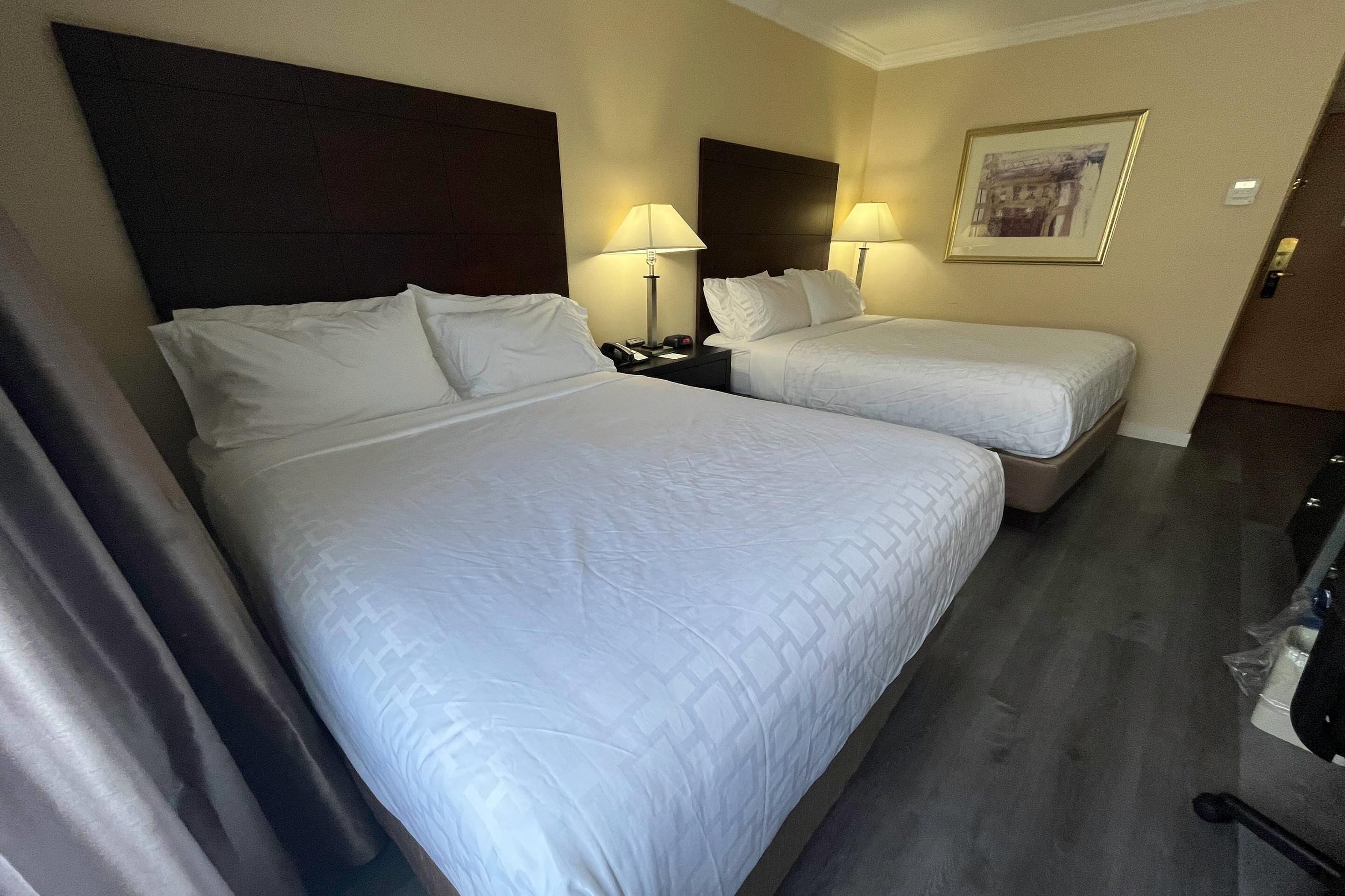 standard room, 2 queen beds, non smoking | desk, soundproofing, iron/ironing board, free cots/infant beds