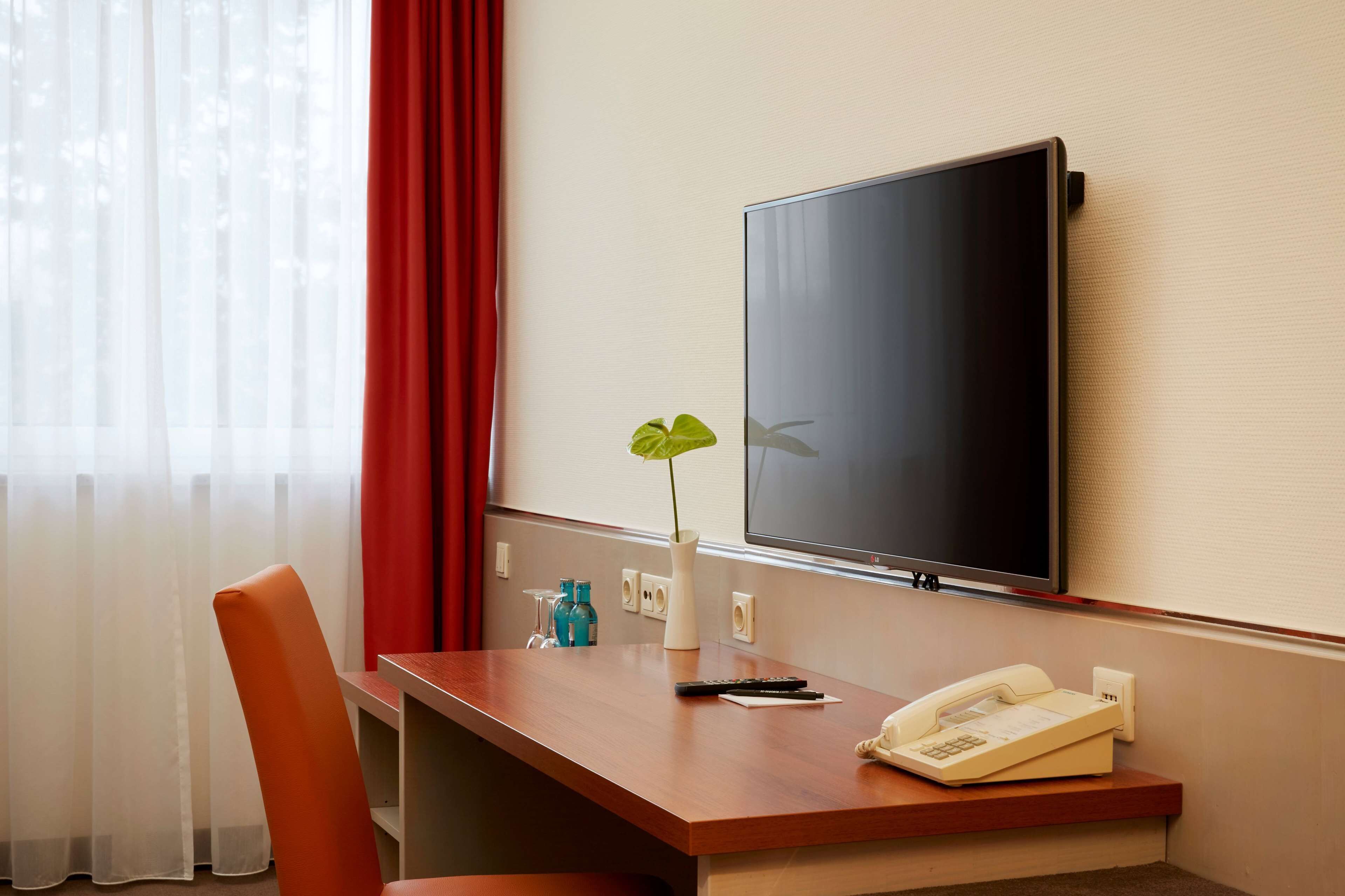 hypo-allergenic bedding, desk, blackout curtains, soundproofing