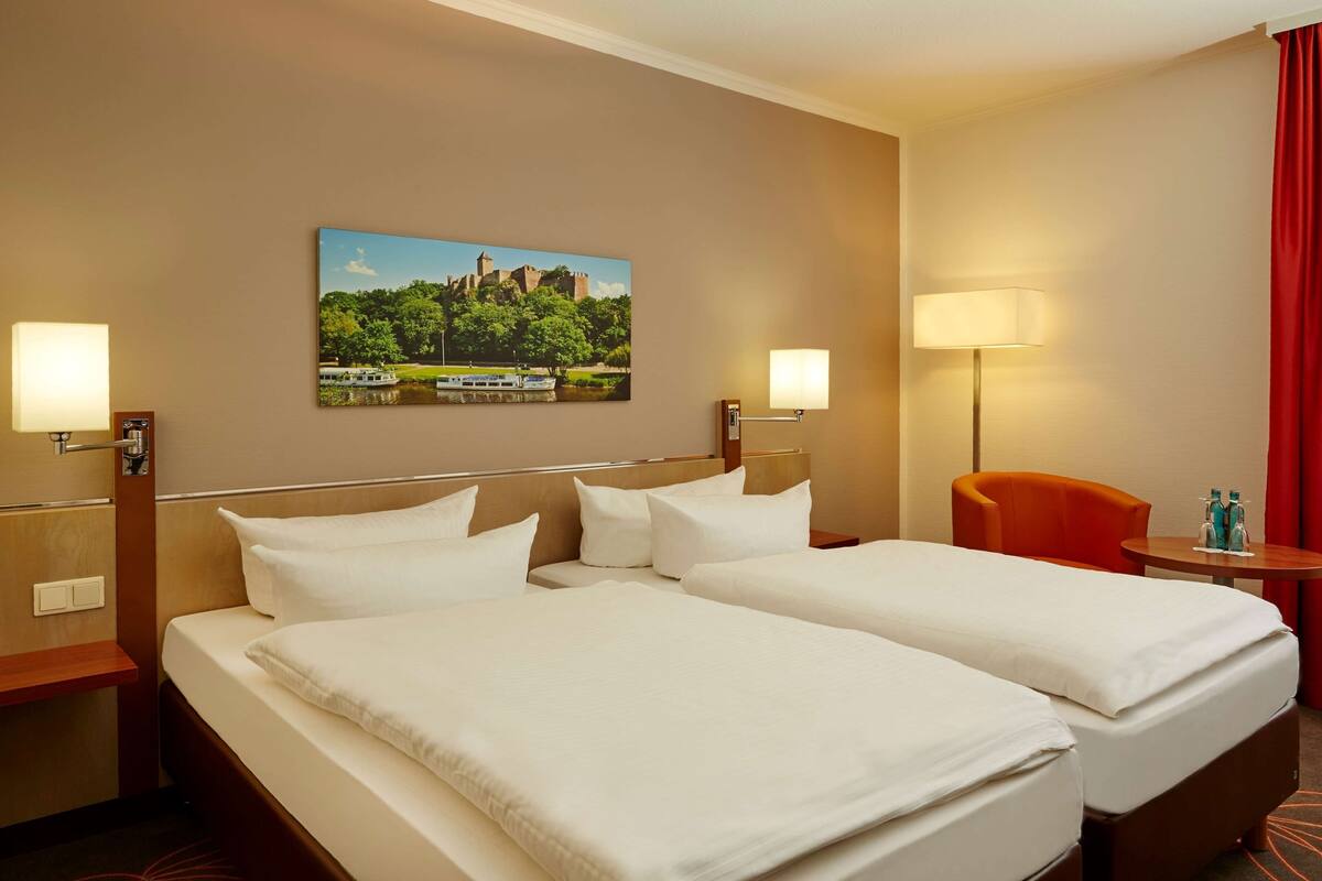 Hypo-allergenic bedding, desk, blackout drapes, soundproofing