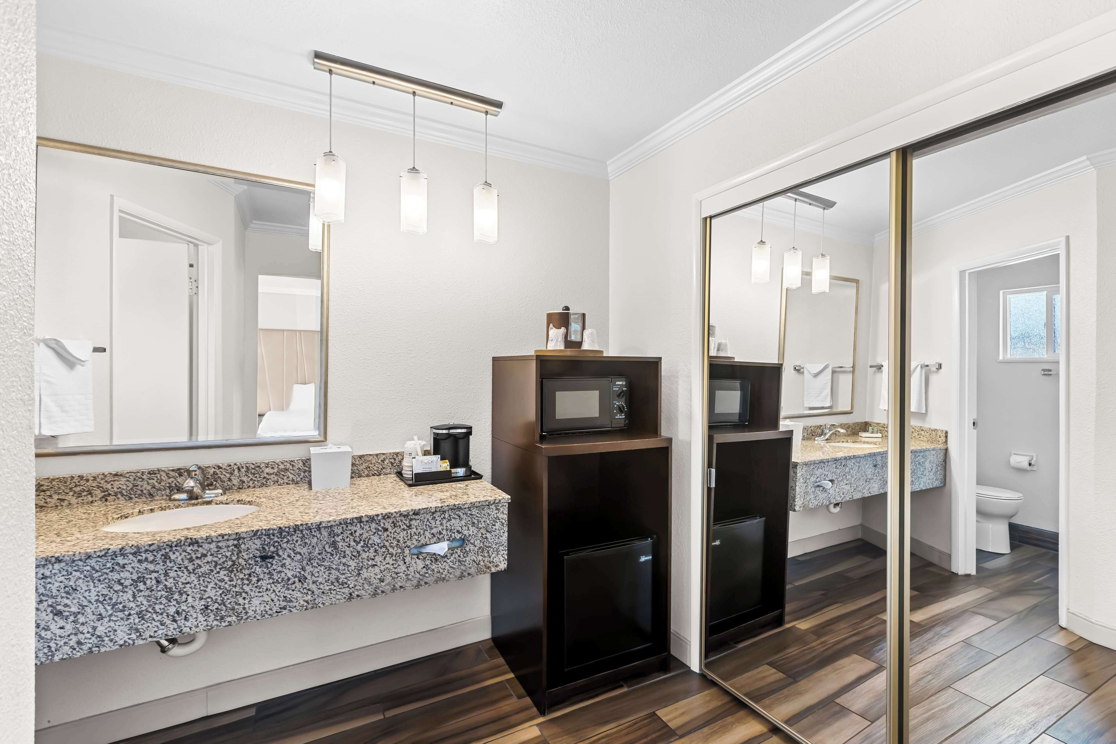 family suite, multiple beds, non smoking | in-room safe, desk, blackout curtains, iron/ironing board