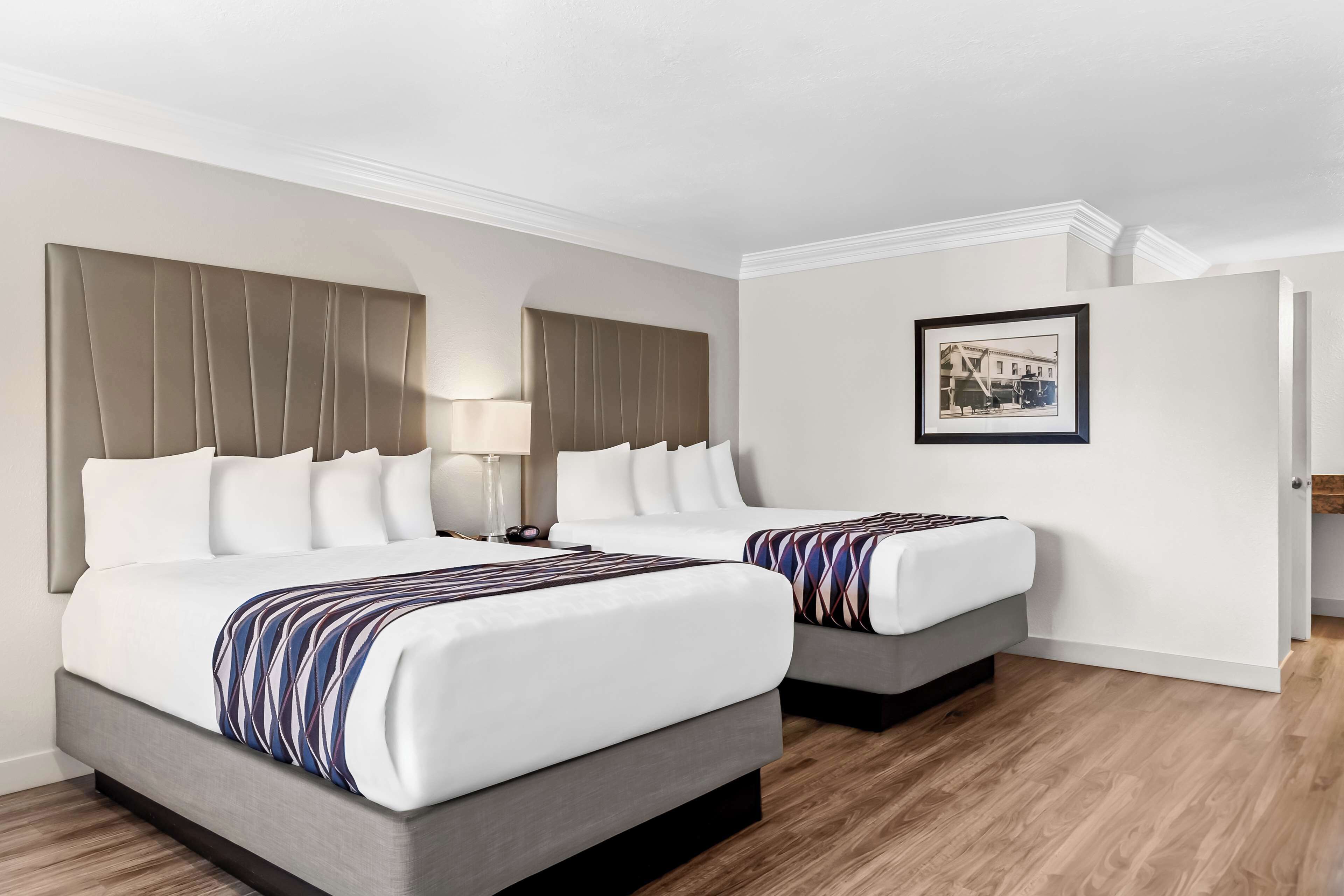 standard room, 2 queen beds, accessible, bathtub | in-room safe, desk, blackout curtains, iron/ironing board