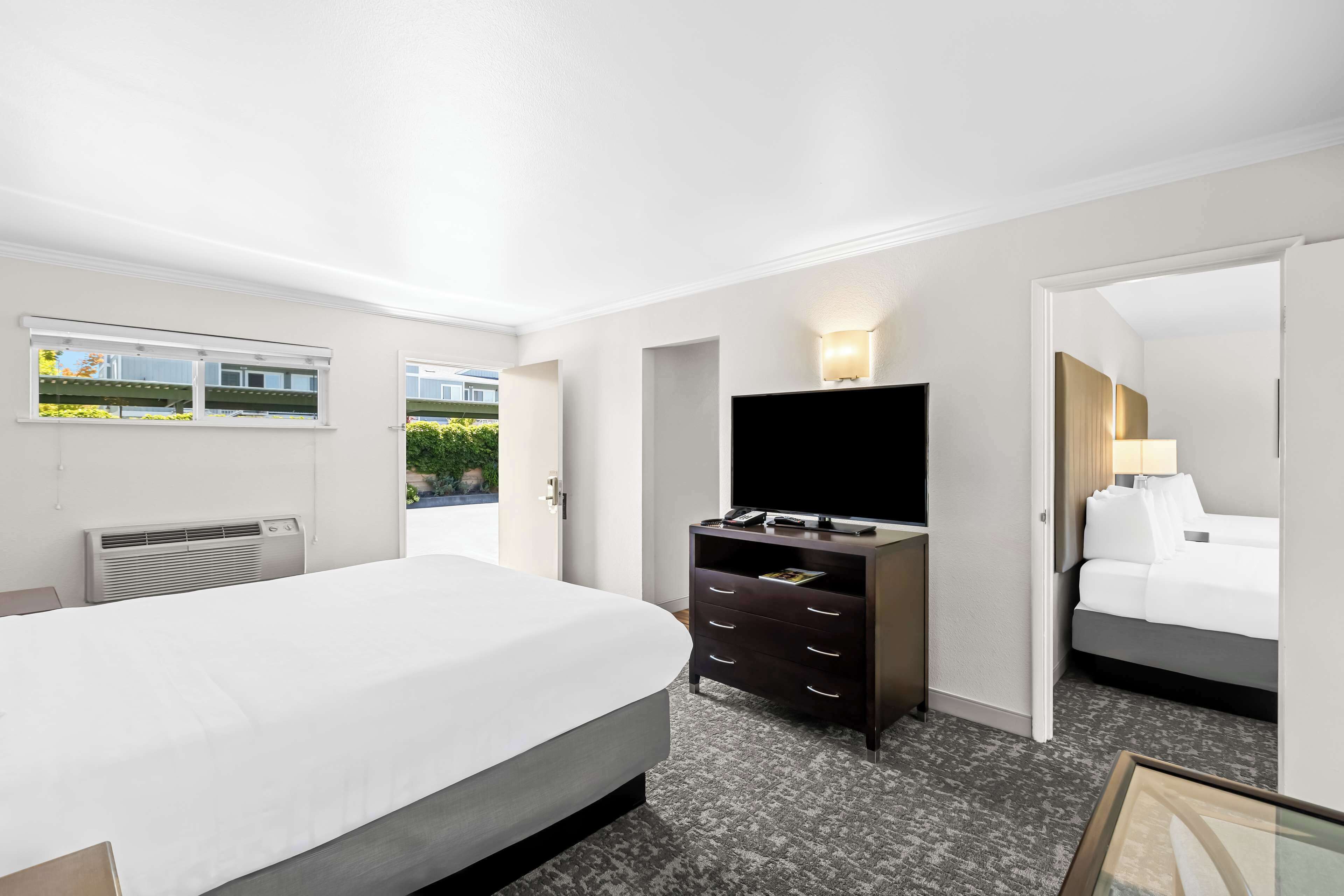 family suite, multiple beds, non smoking | in-room safe, desk, blackout curtains, iron/ironing board