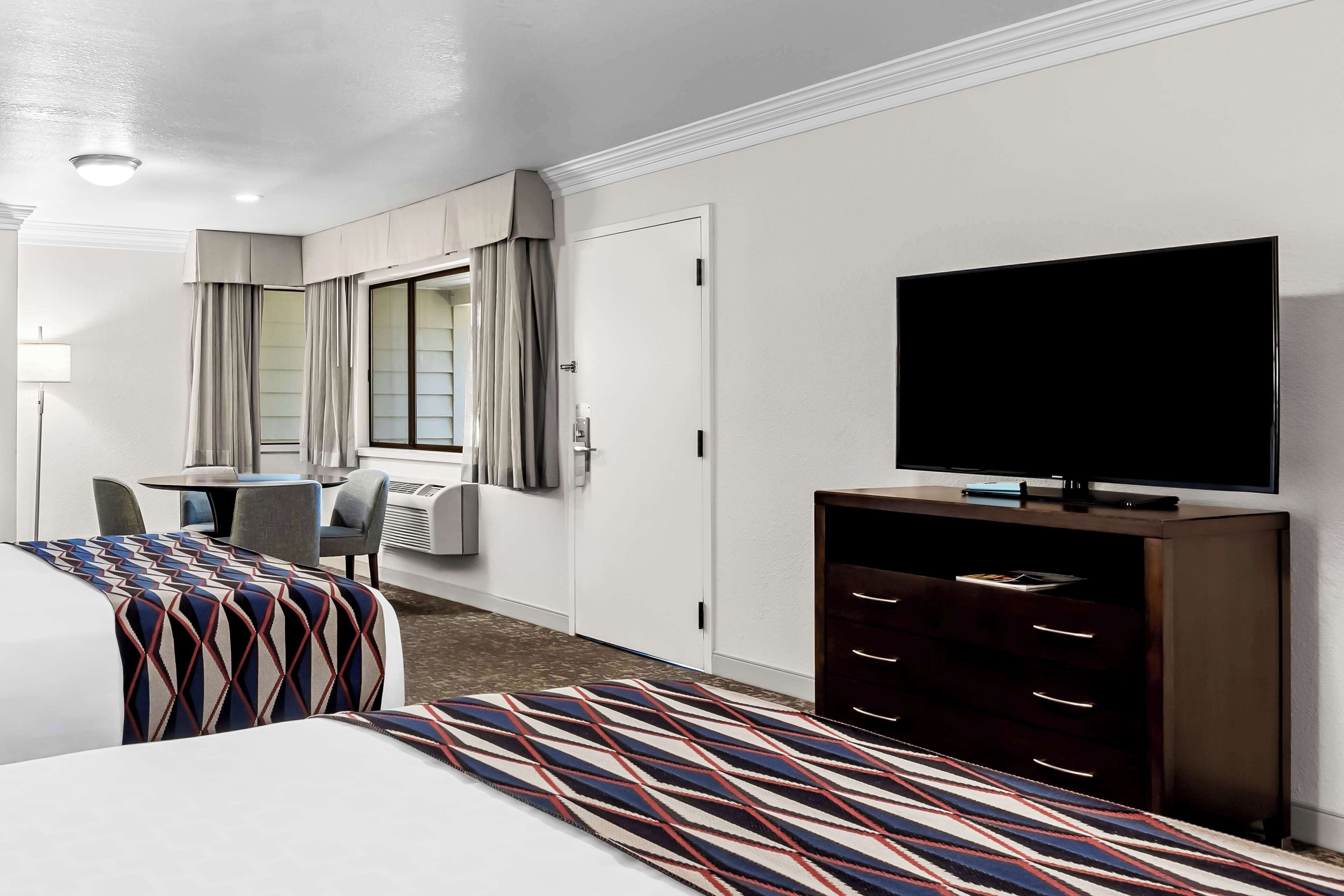 standard room, 2 queen beds, non smoking (dining table;larger room;with sofabed) | in-room safe, desk, blackout curtains, iron/ironing board