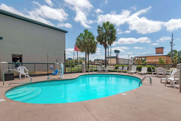 Seasonal outdoor pool, open 10:00 AM to 9:30 PM, pool umbrellas