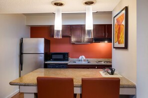 Suite, 1 King Bed, Accessible, Kitchen (with Sofabed, Full Kitchen) | Desk, laptop workspace, blackout drapes, iron/ironing board