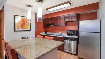 Suite, 2 Queen Beds, Accessible, Non Smoking (with Sofabed, Full Kitchen) | Desk, laptop workspace, blackout drapes, iron/ironing board