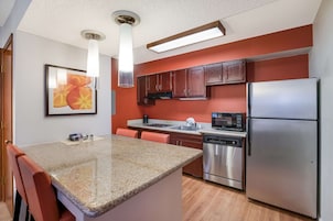 Suite, 2 Queen Beds, Accessible, Non Smoking (with Sofabed, Full Kitchen) | Desk, laptop workspace, blackout drapes, iron/ironing board