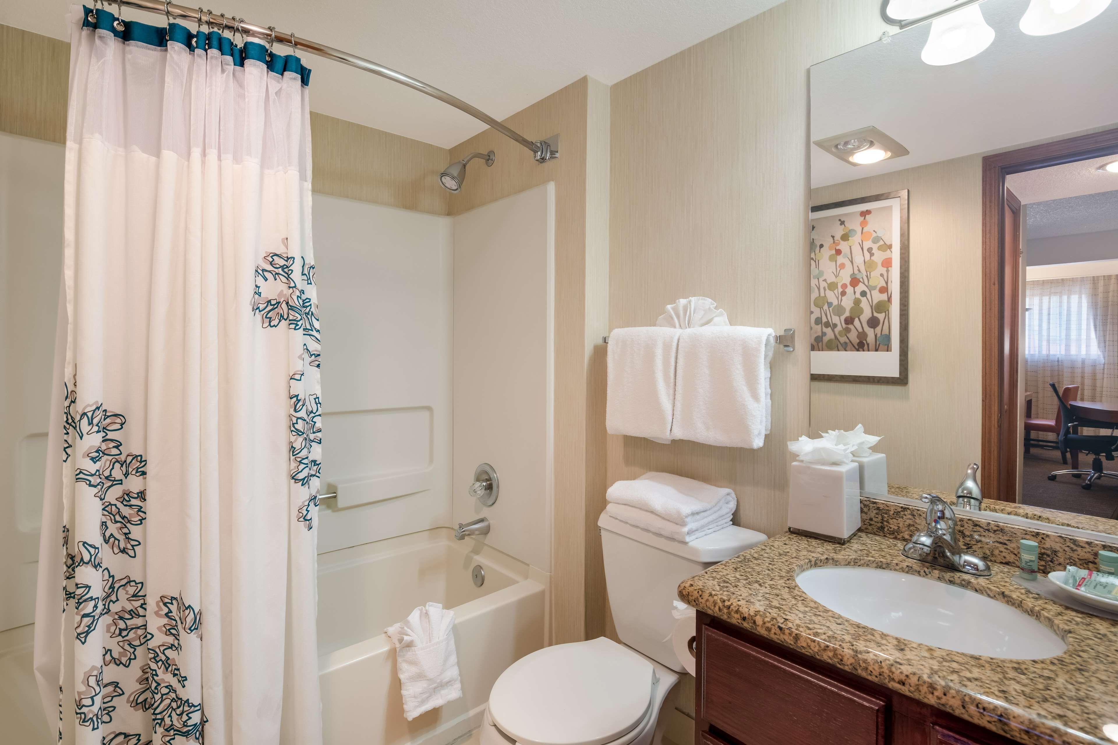 suite, 2 queen beds, non smoking, kitchen (with sofabed, full kitchen) | bathroom | combined shower/bathtub, eco-friendly toiletries, hair dryer, towels