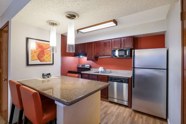 Suite, 2 Queen Beds, Non Smoking (with Sofabed, Full Kitchen) | Desk, laptop workspace, blackout drapes, iron/ironing board