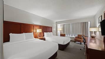 Premium bedding, down comforters, pillowtop beds, in-room safe