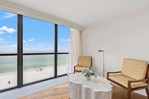 Presidential Suite, 1 King Bed | Living area | 65-inch TV with cable channels