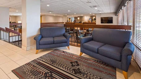 Lobby sitting area. Days Inn by Wyndham Englewood Dayton Airport