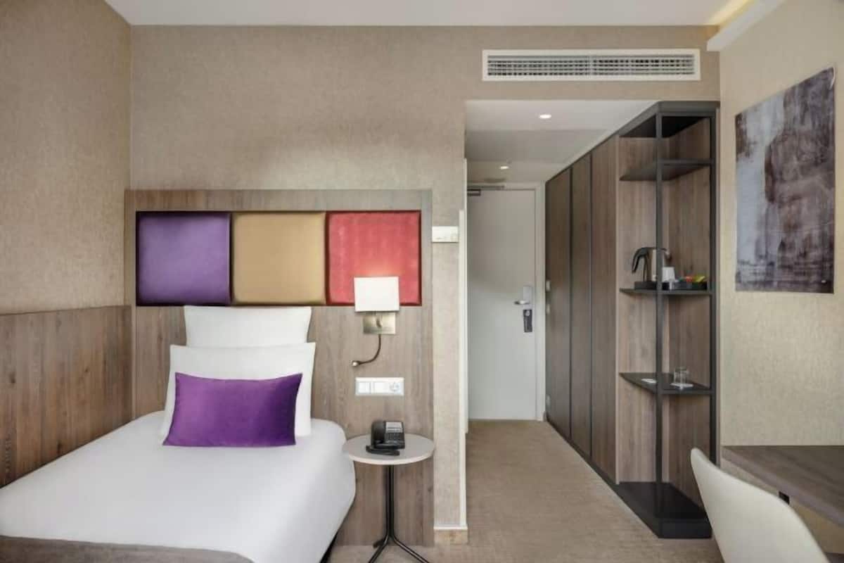 1 dormitorio, ropa de cama de alta calidad, minibar y caja fuerte