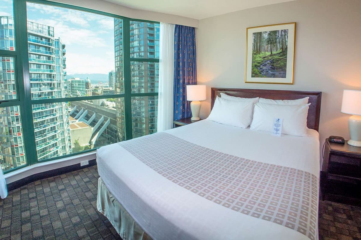 premium bedding, desk, blackout curtains, iron/ironing board