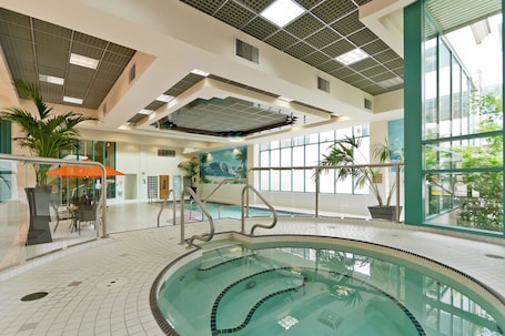 Indoor spa tub. Rosedale On Robson Suite Hotel