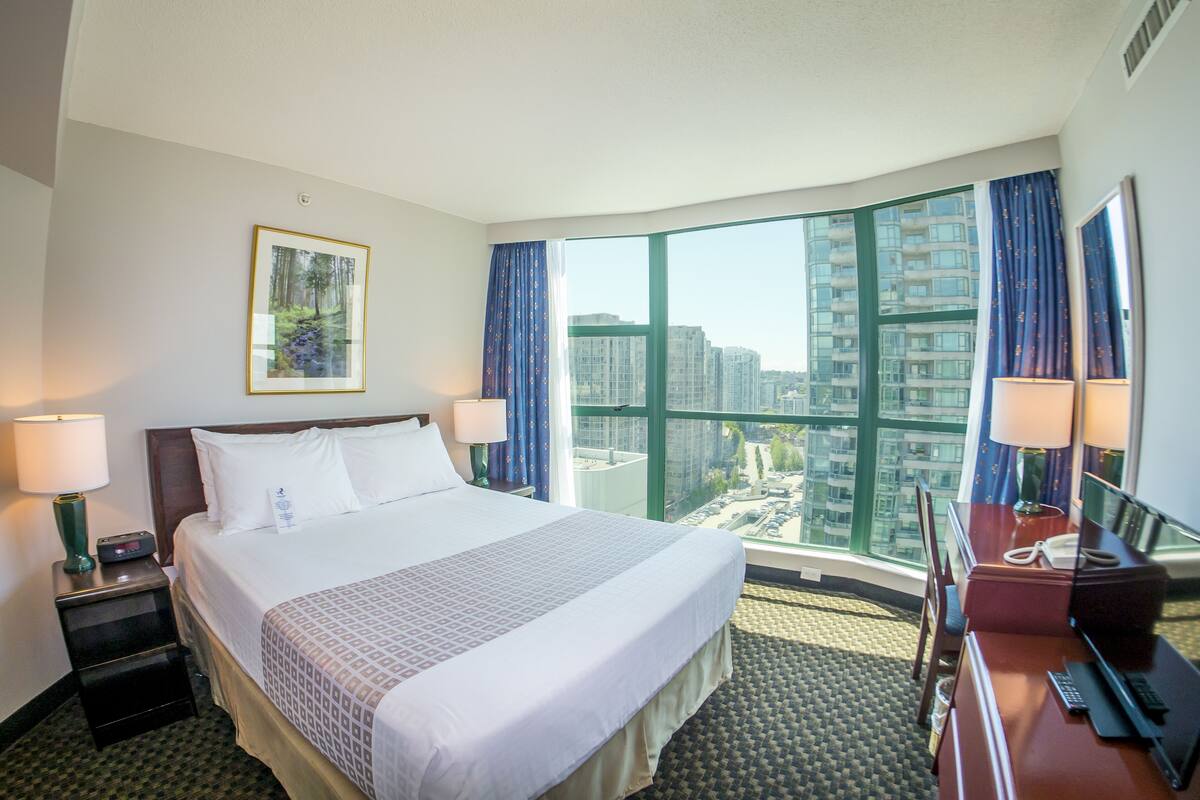 Suite Deluks, 1 Tempat Tidur King | 1 kamar tidur, seprai premium, meja kerja, dan tirai kedap cahaya