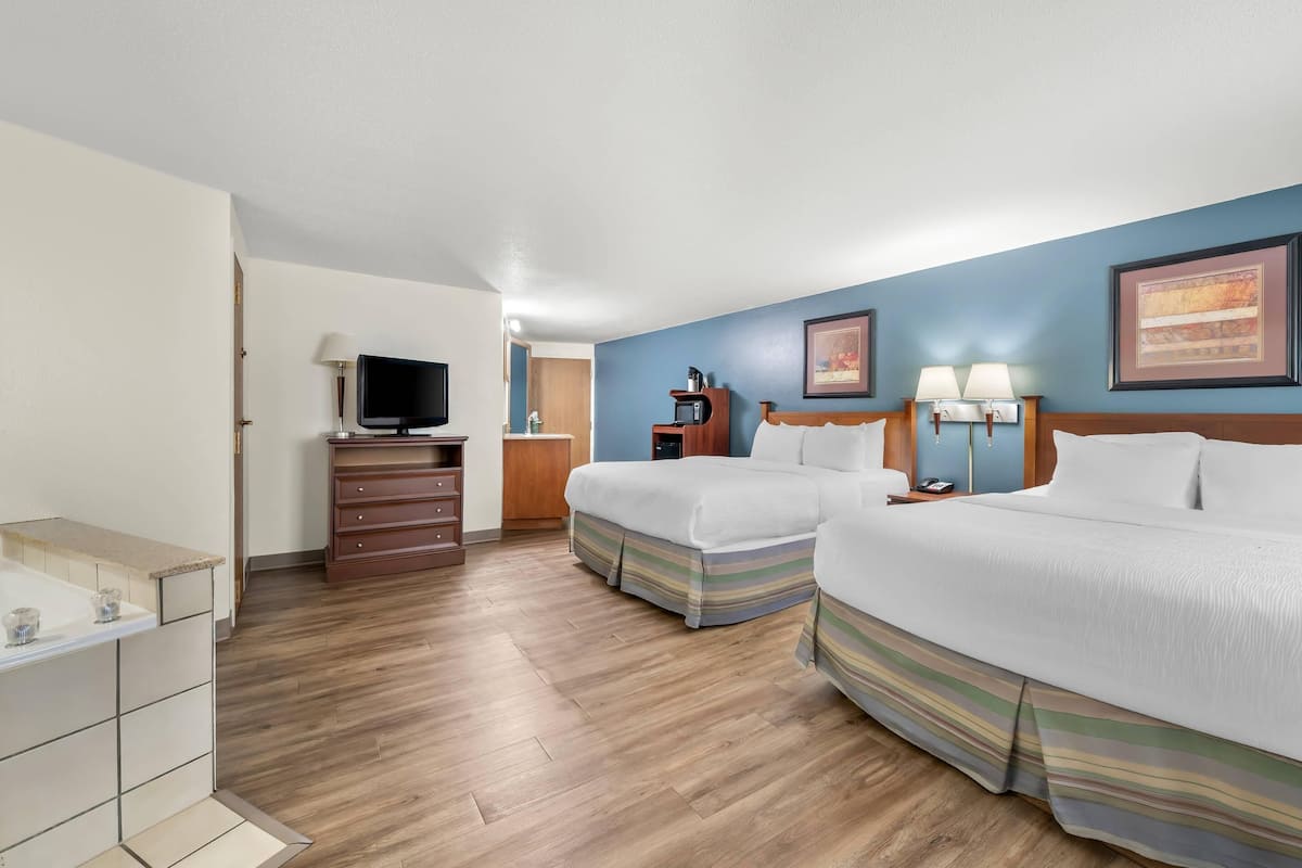 Standard Room, 2 Queen Beds, Non Smoking, Jetted Tub | In-room safe, individually decorated, individually furnished