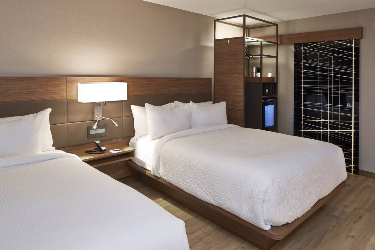 Hypo-allergenic bedding available, in-room safe, desk, laptop workspace