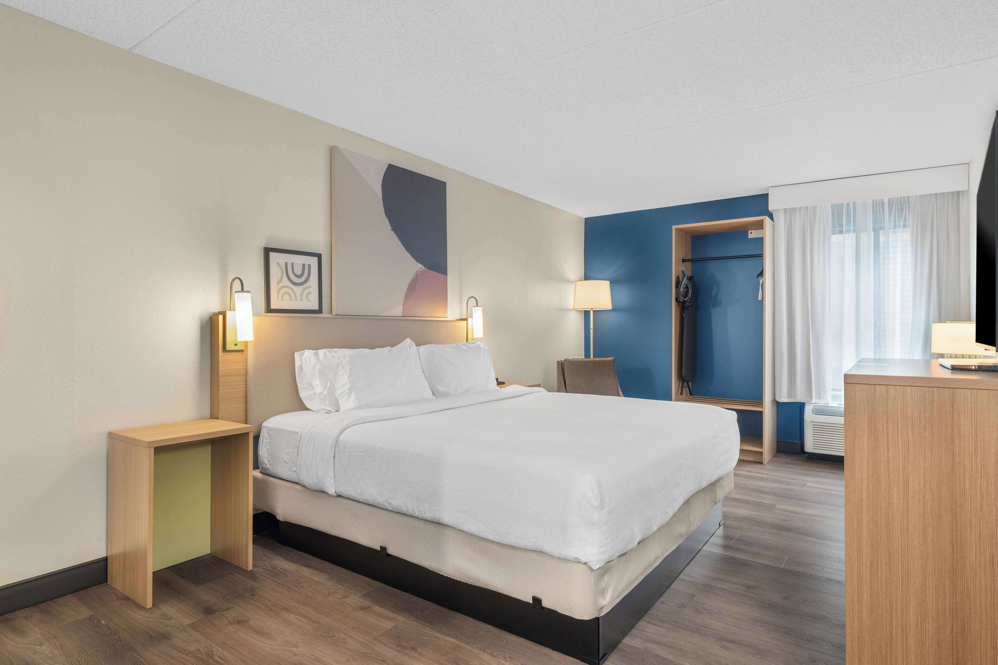 room, 1 king bed | desk, laptop workspace, blackout curtains, iron/ironing board