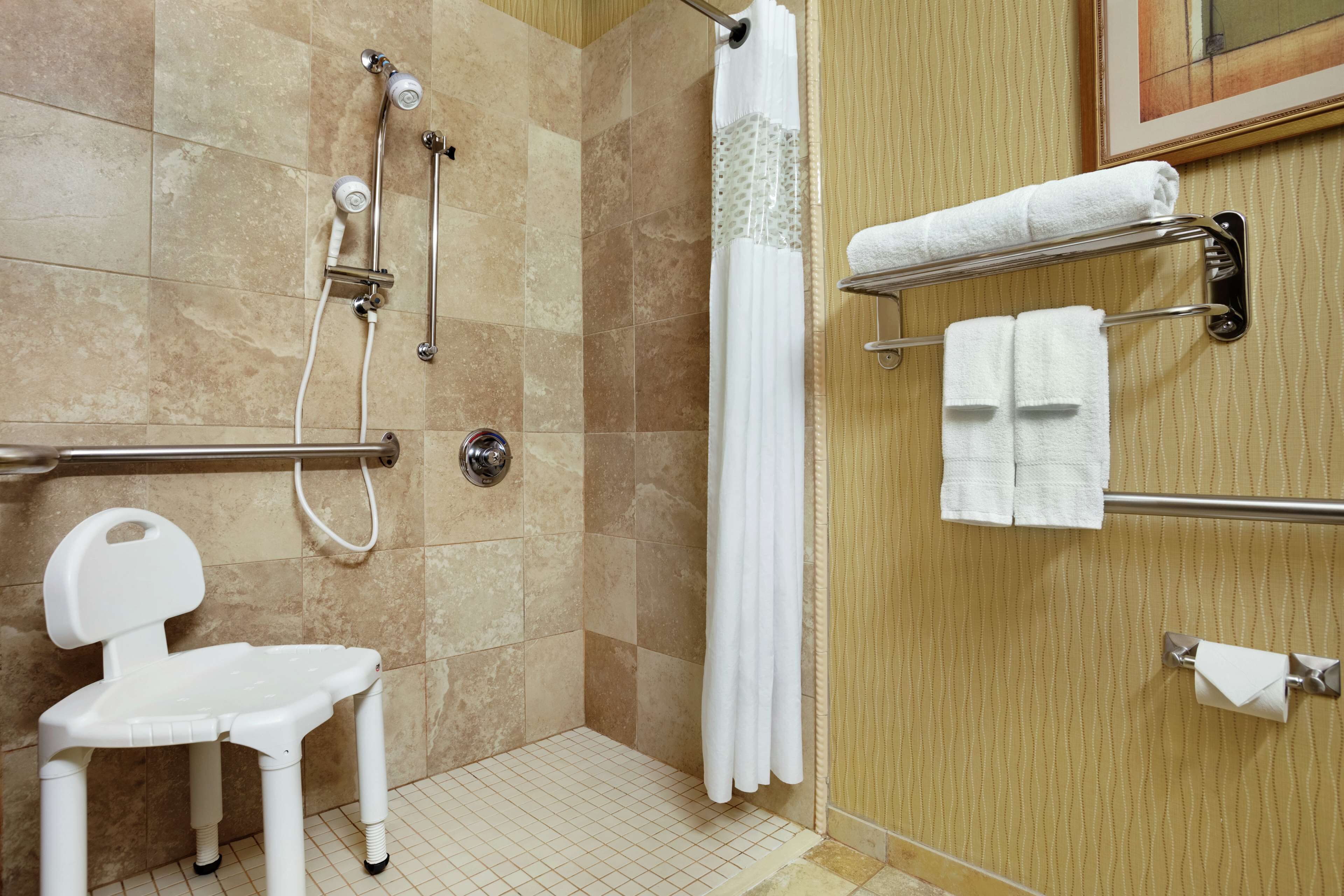 room, 1 king bed, accessible, non smoking | bathroom | combined shower/bathtub, designer toiletries, hair dryer, towels