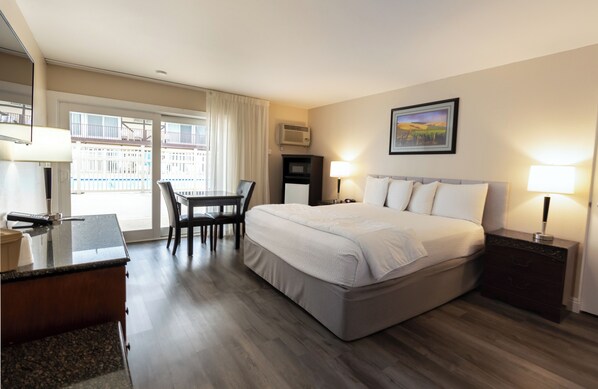 Signature Room, 1 King Bed Ground Floor, Patio (1 king bed nonsmoking) | Premium bedding, down comforters, pillowtop beds, individually decorated - King Frederik Inn (Solvang)