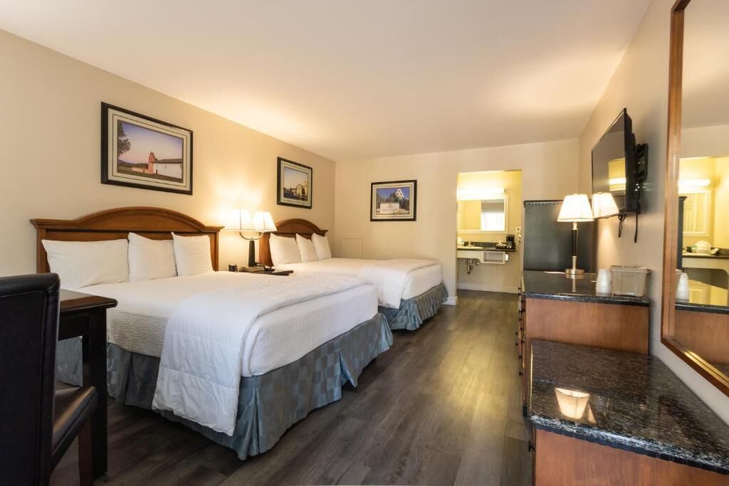 Premium bedding, down comforters, pillowtop beds, desk