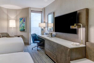 Premium bedding, down comforters, pillowtop beds, in-room safe