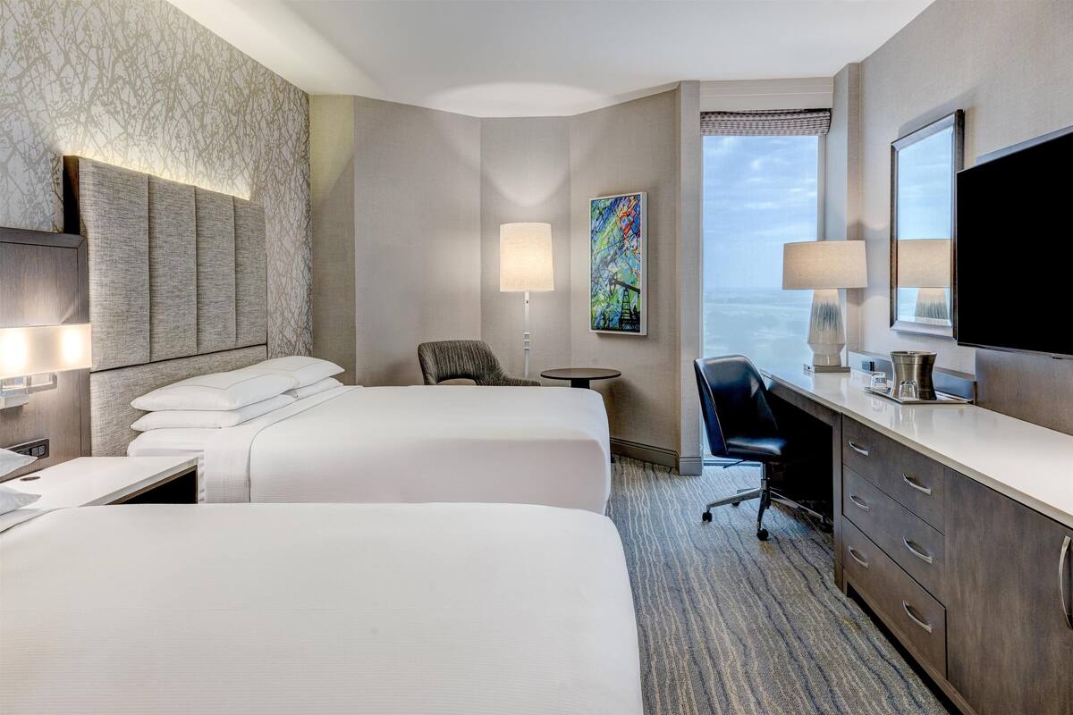 Premium bedding, down comforters, pillowtop beds, in-room safe