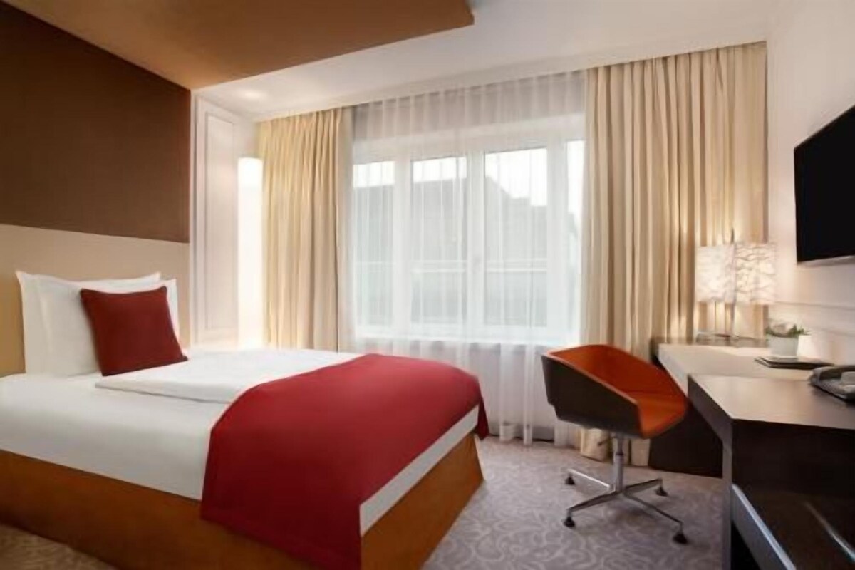 Luxe beddengoed, donsdekens, pillowtop-bedden, een minibar