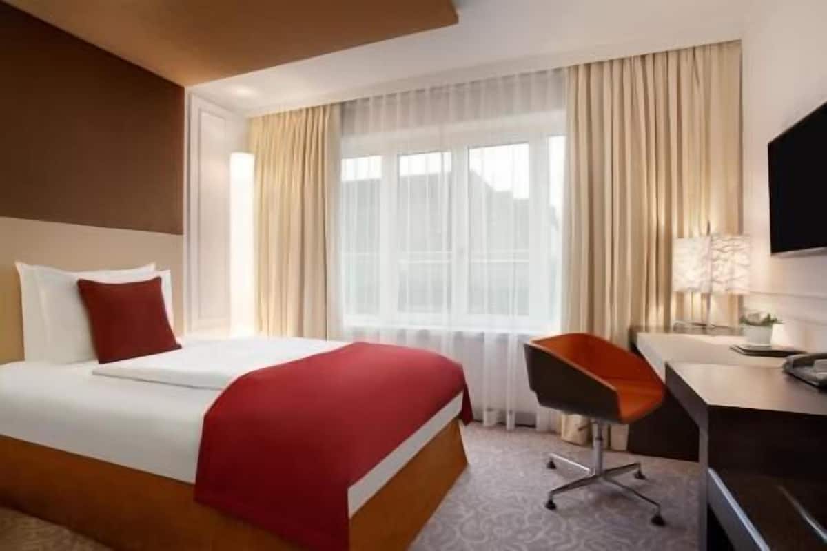 Premium bedding, down comforters, pillowtop beds, minibar