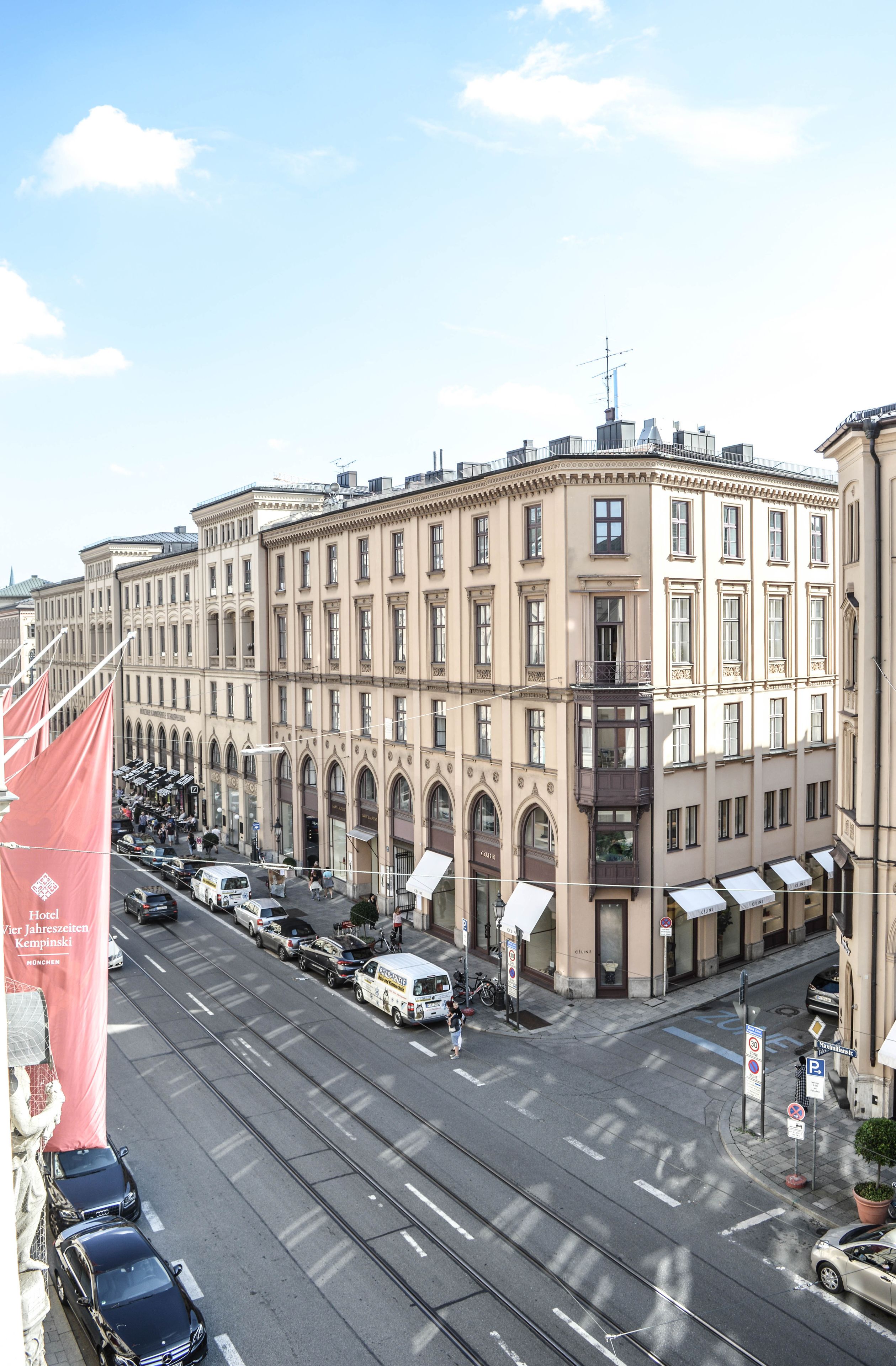 A historic building with a central courtyard, multiple floors, and a prominent entrance.