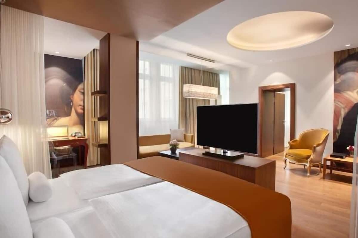 Premium bedding, down comforters, pillowtop beds, minibar