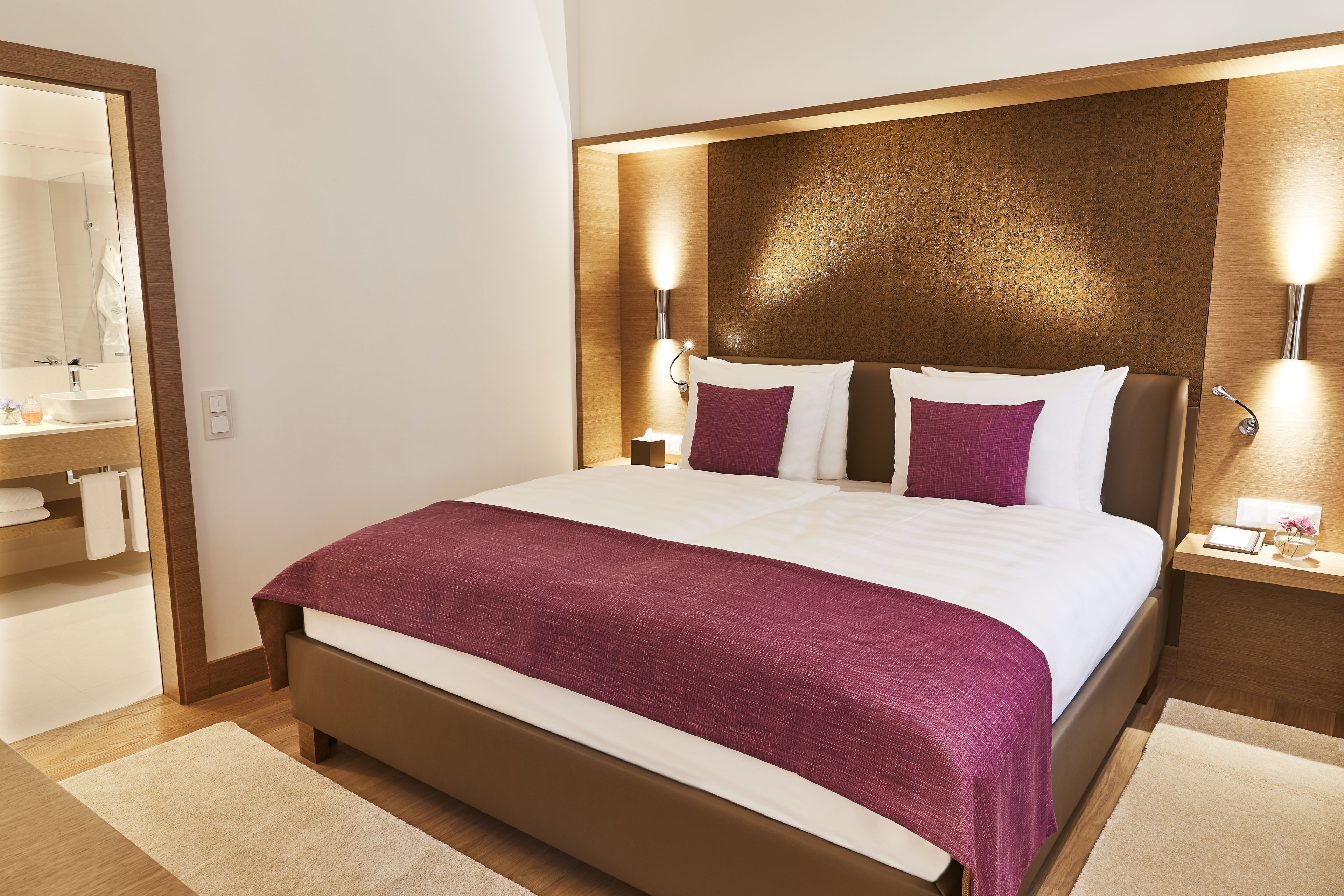 Premium bedding, down comforters, pillowtop beds, minibar