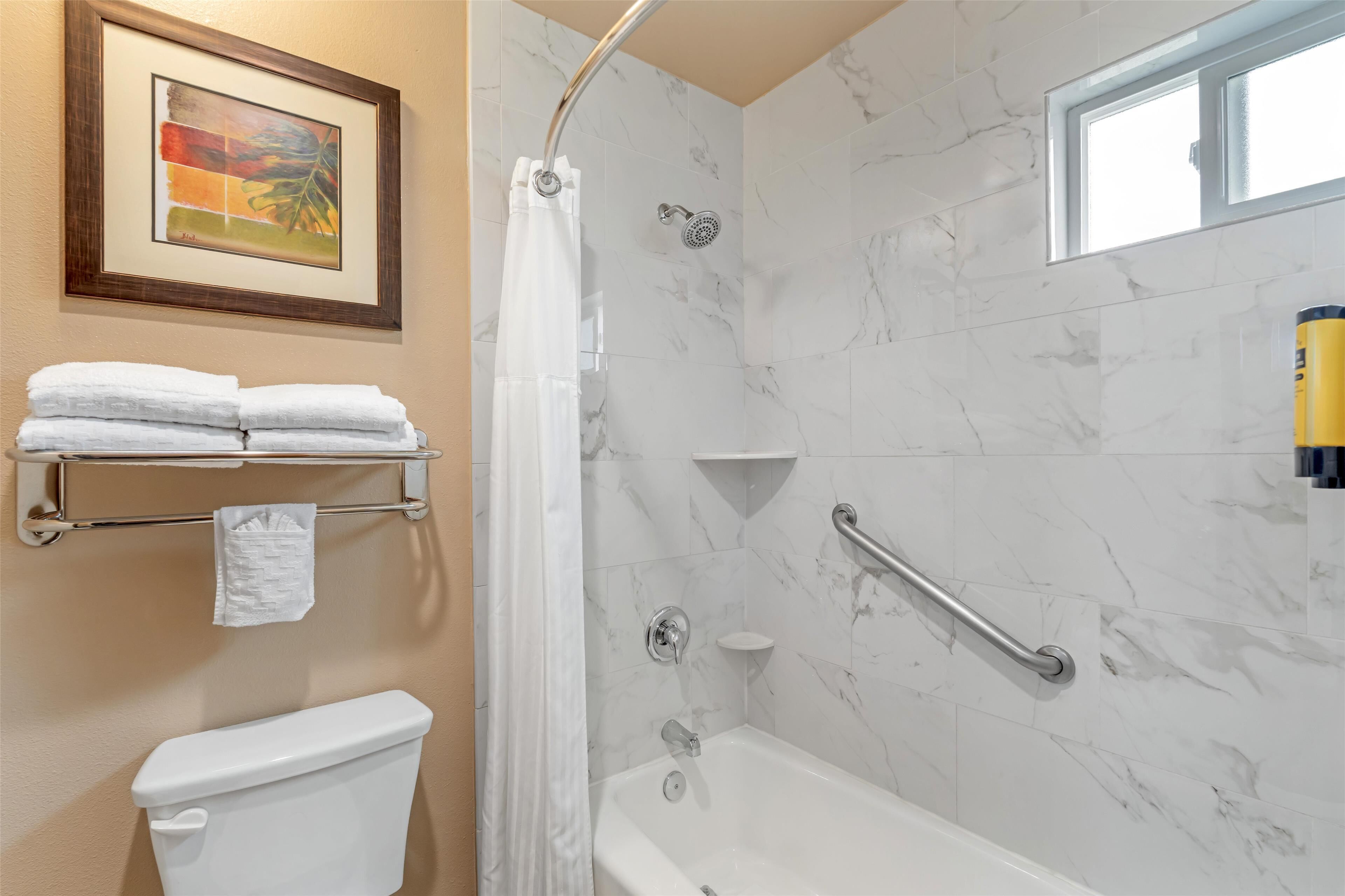 room, 2 double beds | bathroom | combined shower/bathtub, eco-friendly toiletries, hair dryer, towels