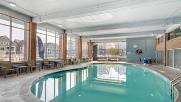 Indoor pool, open 8:00 AM to 10:00 PM, pool loungers