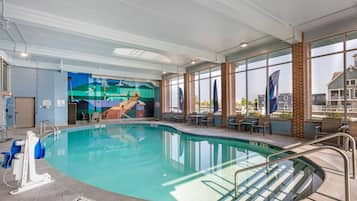 Indoor pool, open 8:00 AM to 10:00 PM, pool loungers