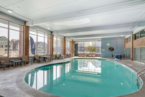 Indoor pool, open 8:00 AM to 10:00 PM, pool loungers