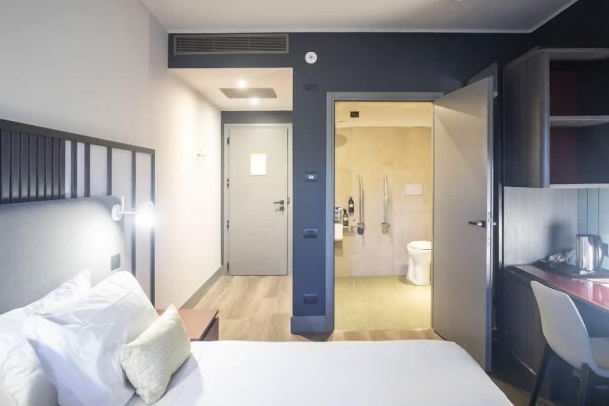 Premium bedding, down duvets, Select Comfort beds, minibar