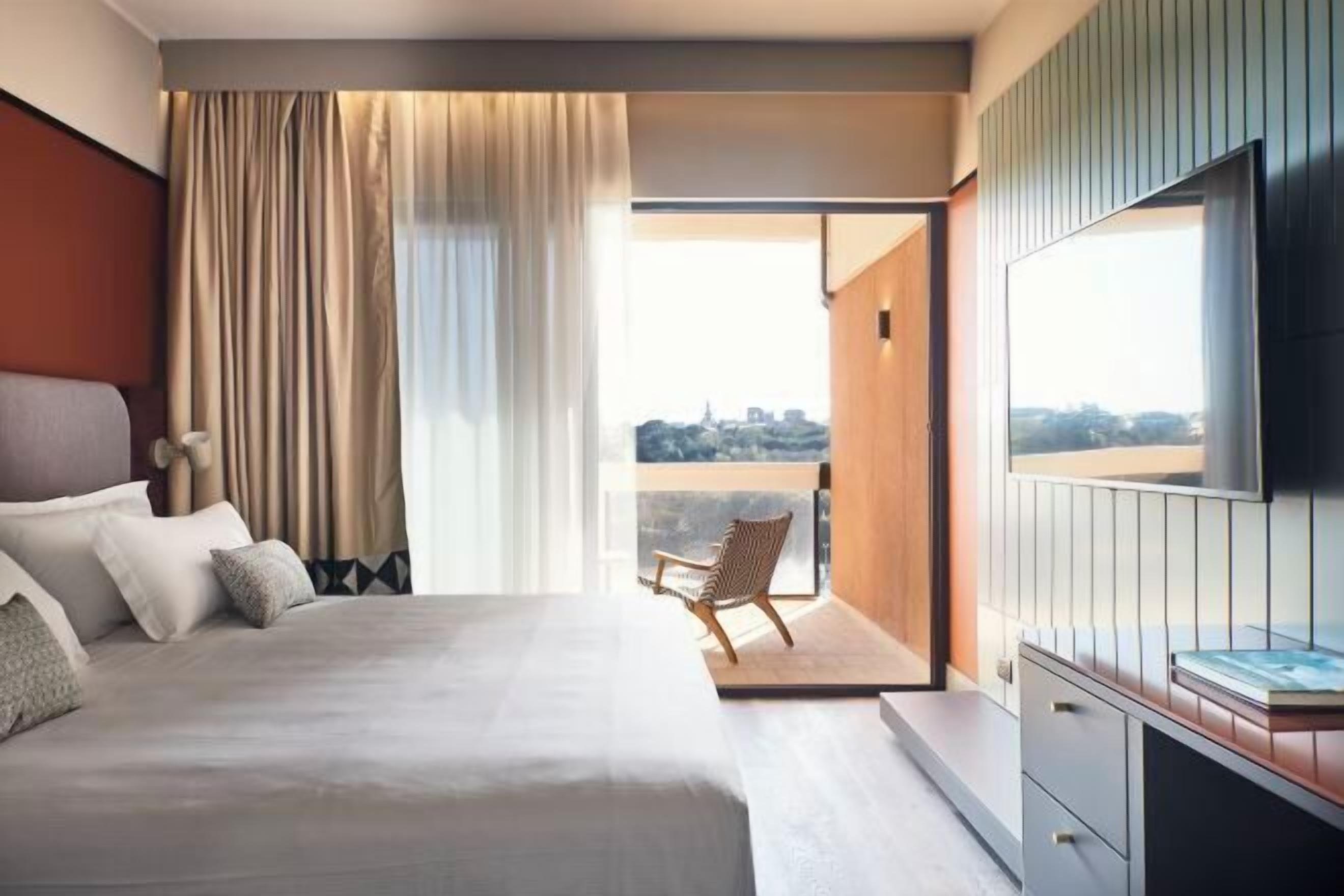 Premium bedding, down duvets, Select Comfort beds, minibar