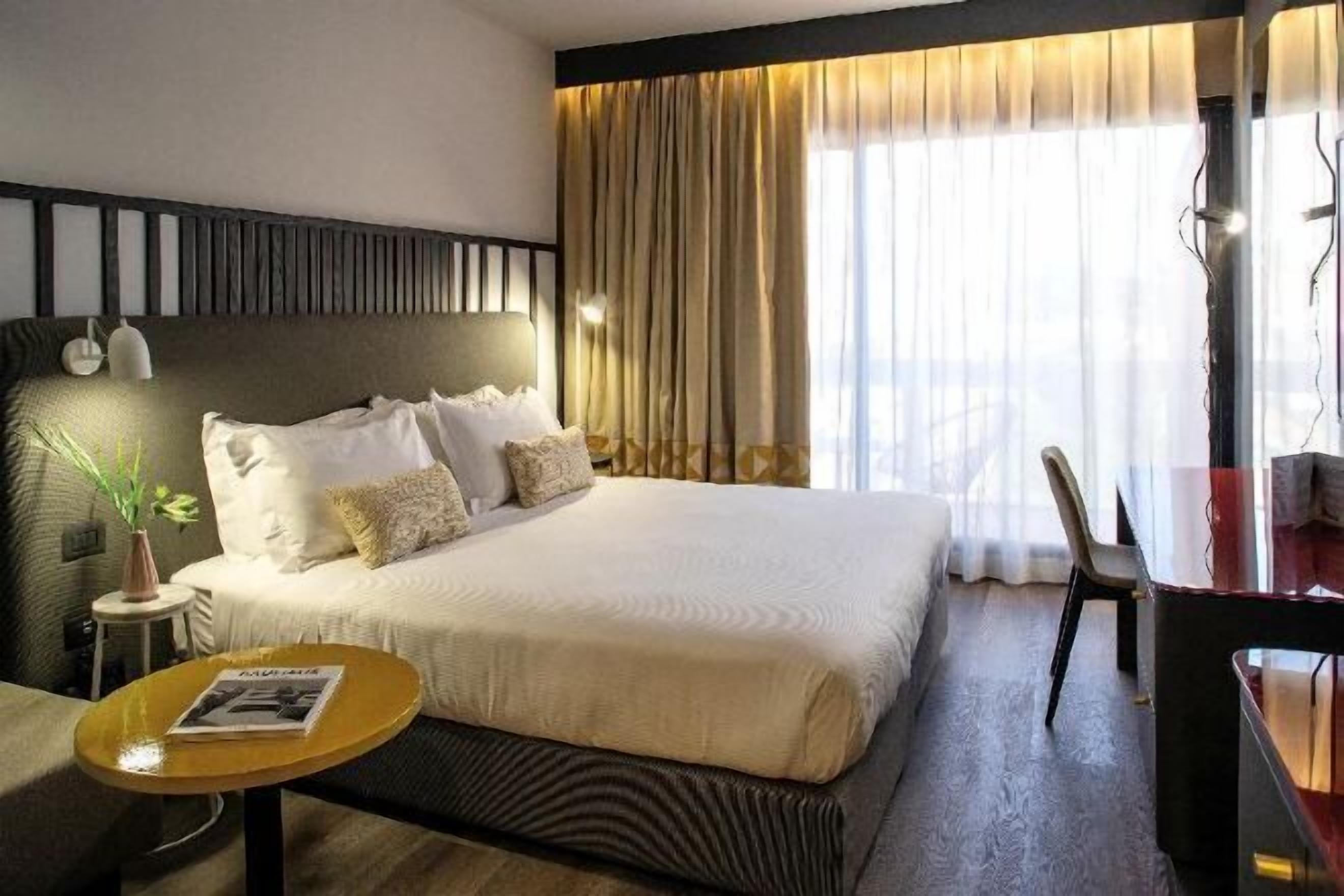 Premium bedding, down duvets, Select Comfort beds, minibar