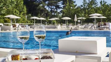 Breakfast, lunch served; local and international cuisine, pool views