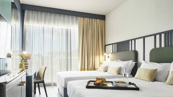 Luxe beddengoed, donzen dekbedden, Select Comfort-bedden, een minibar