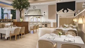 Un restaurante moderno con varias mesas, un árbol central y una zona de cocina.