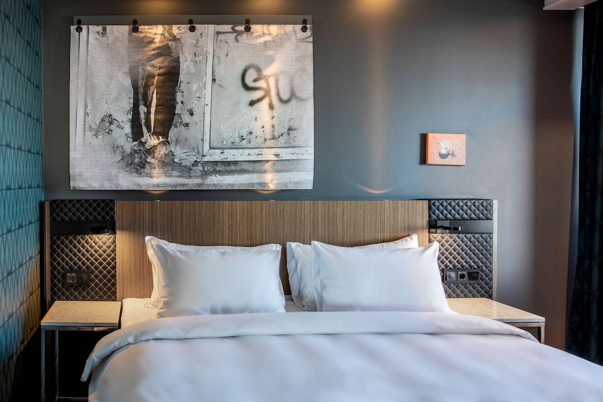 junior suite | 1 bedroom, in-room safe, desk, laptop workspace