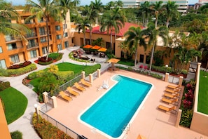 Outdoor pool, open 6:00 AM to 11:00 PM, pool umbrellas, pool loungers