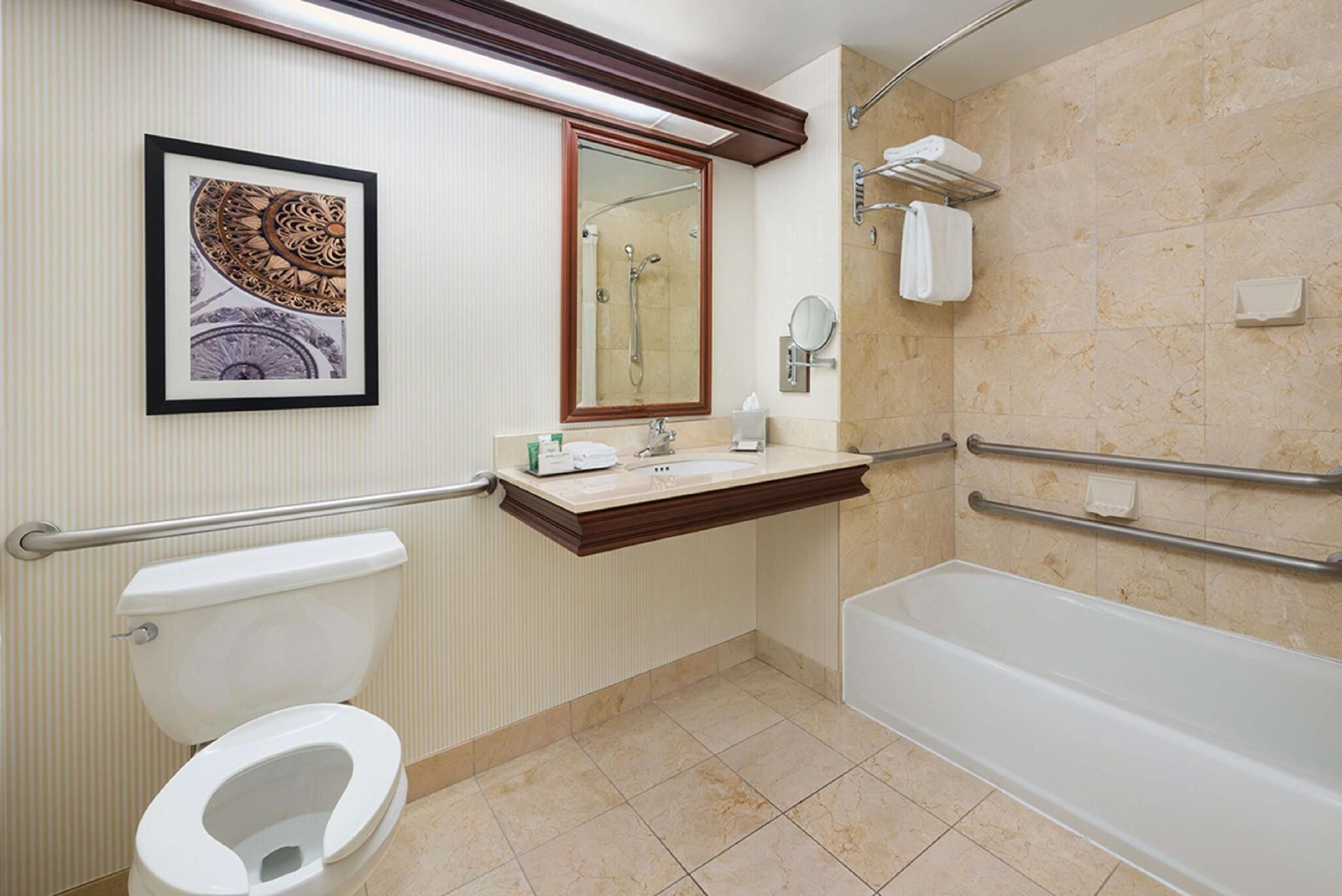 Combined shower/tub, designer toiletries, hair dryer, bathrobes