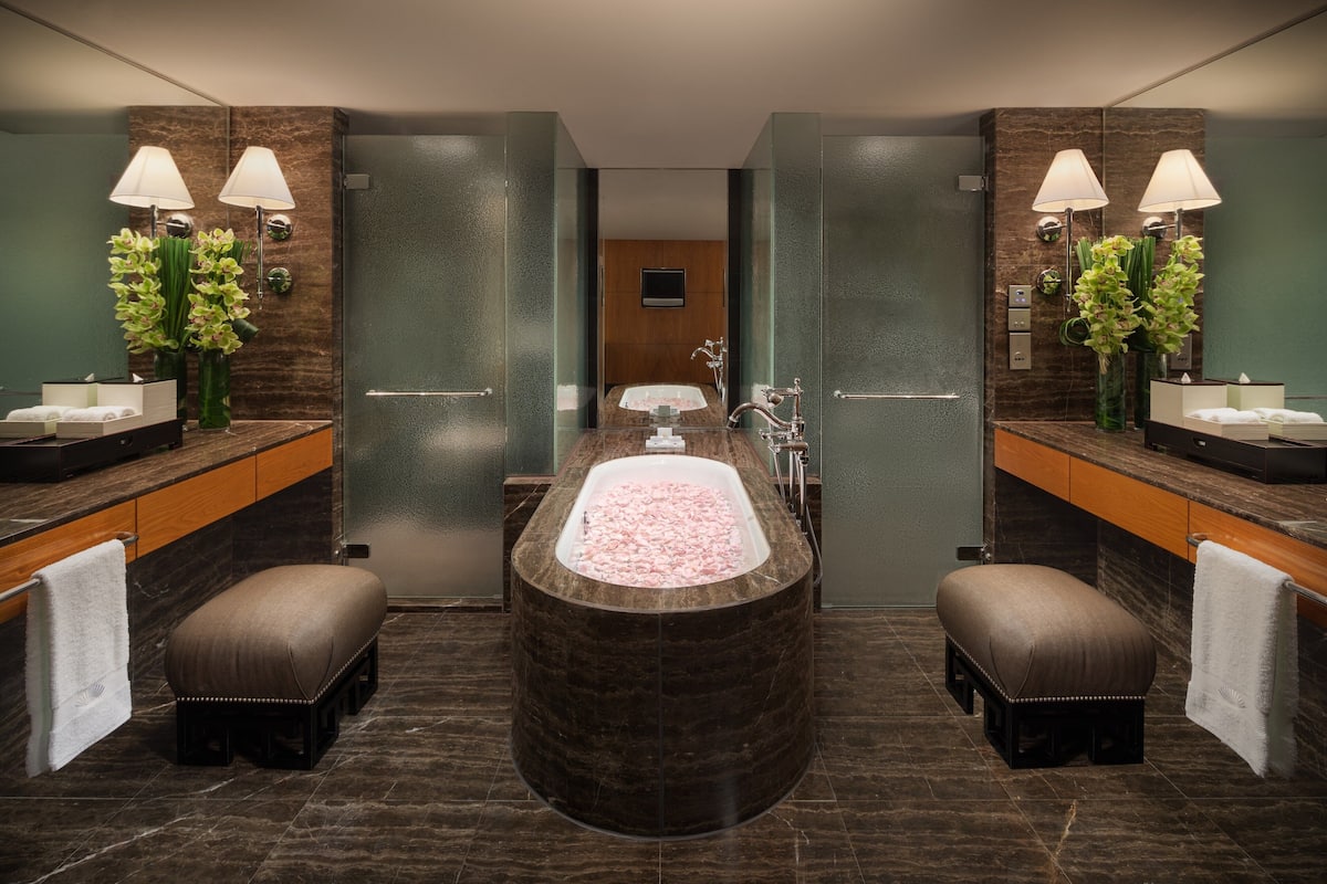 separate bathtub and shower, designer toiletries, hair dryer, bathrobes