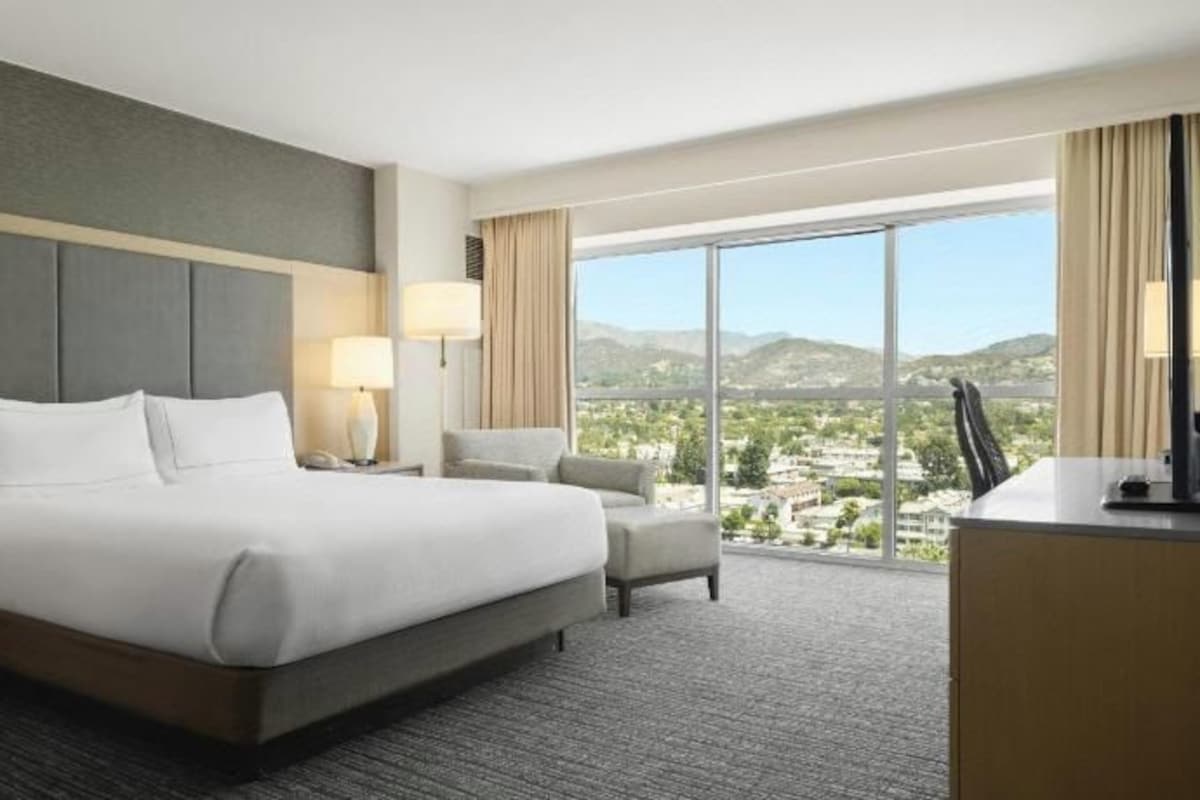 Premium bedding, down duvets, pillow-top beds, in-room safe