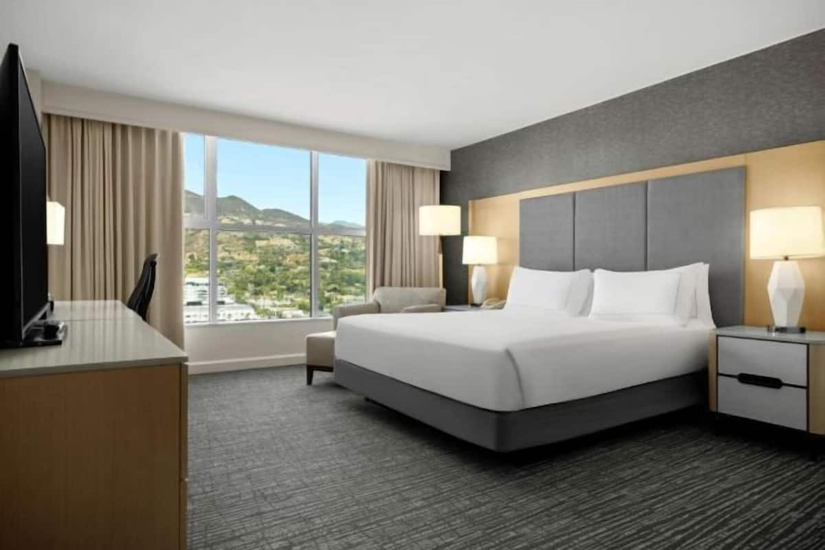 Premium bedding, down comforters, pillowtop beds, in-room safe