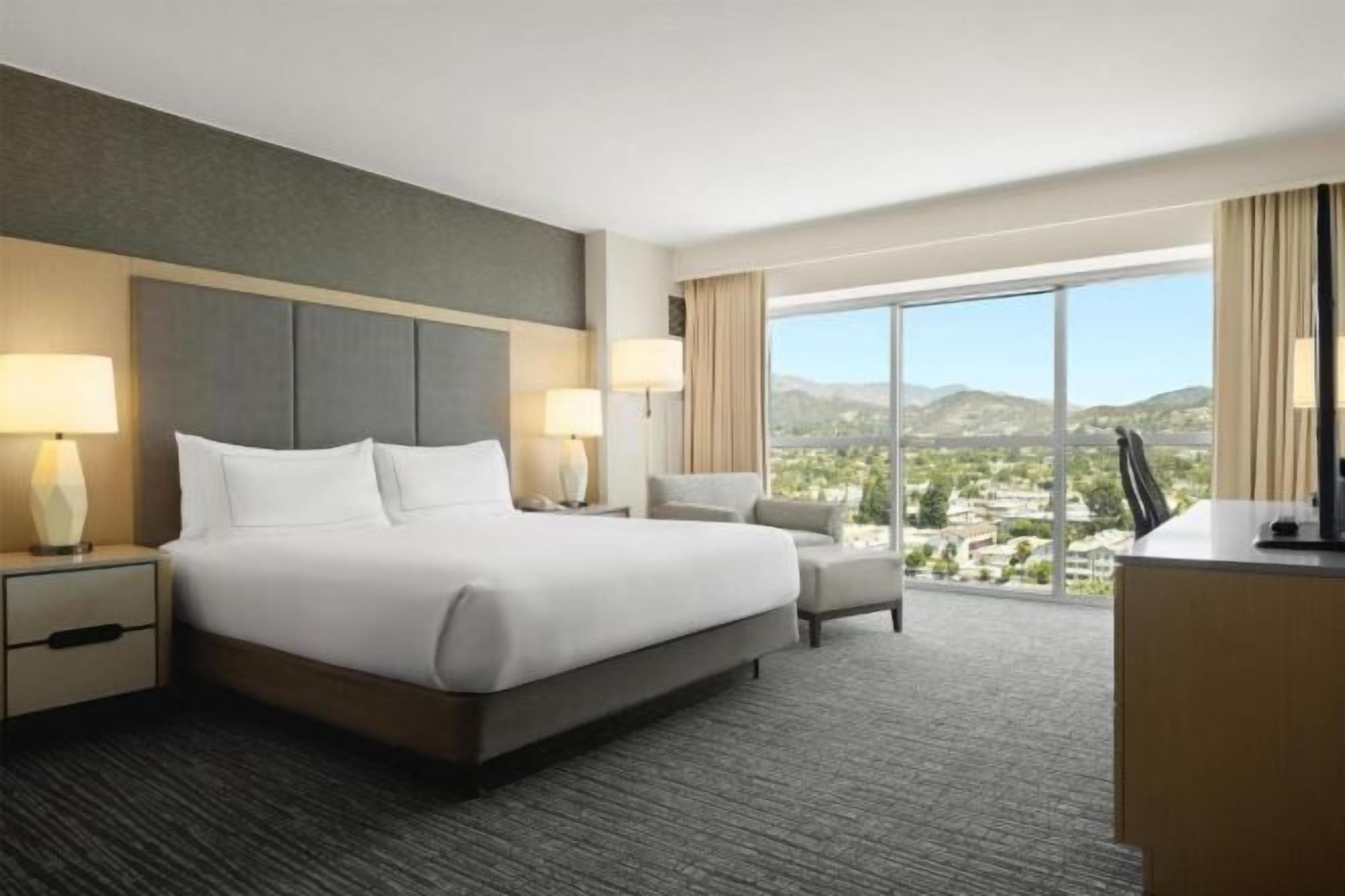 Premium bedding, down comforters, pillowtop beds, in-room safe